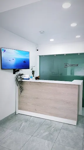 ALDental reception desk and clinic logo